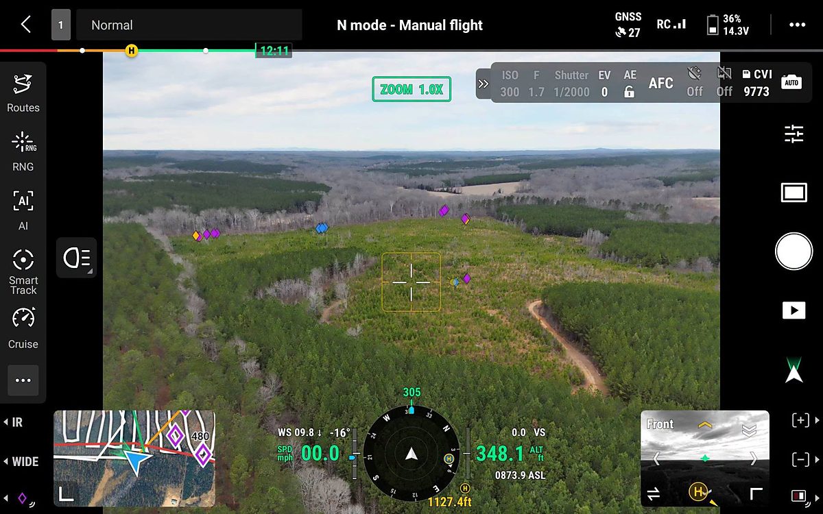 Drone screen showing deer marked across a field during a herd survey