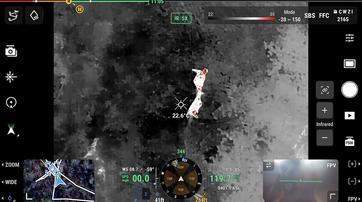 Live thermal feed from the drone: a deer lit up in the timber